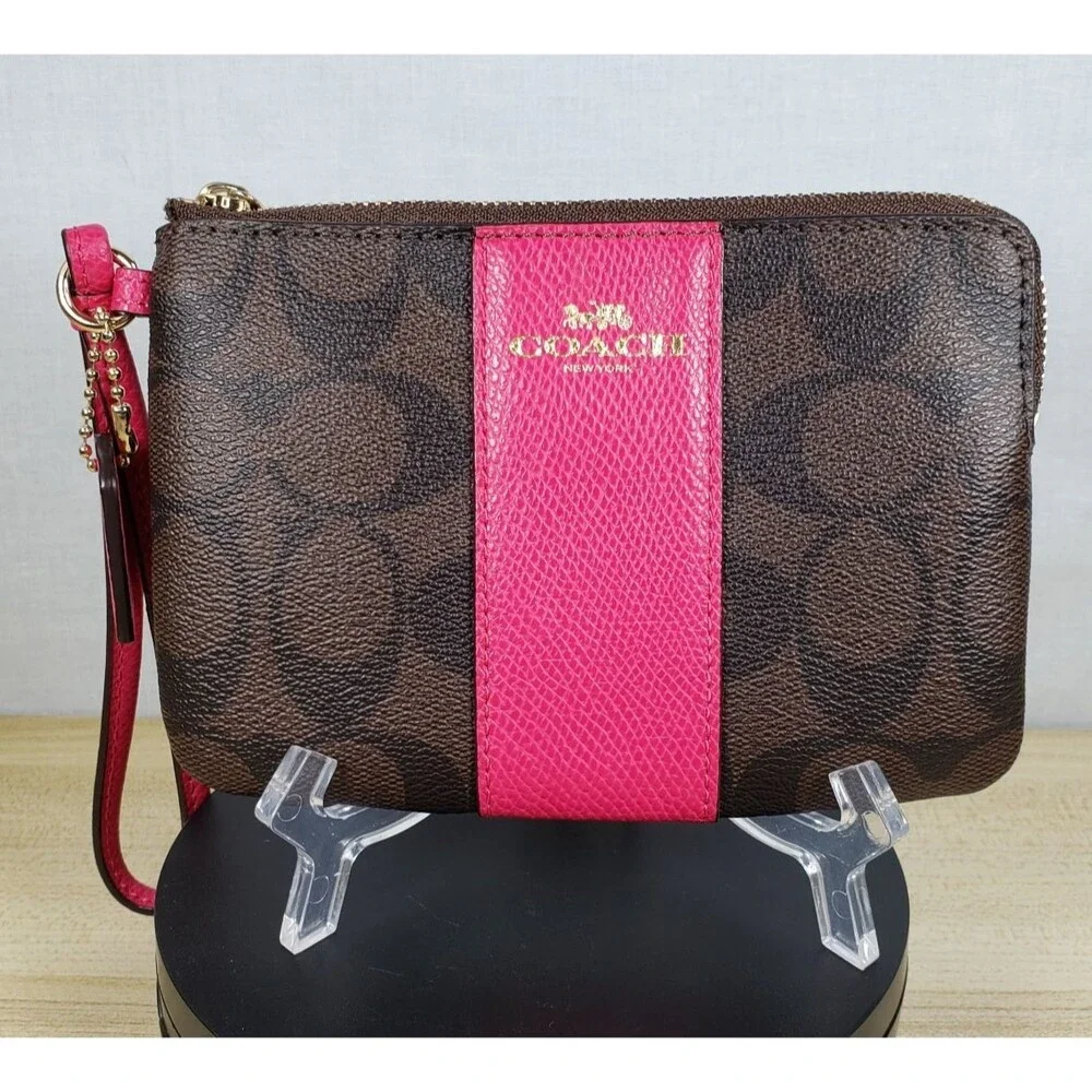 COACH Corner Zip Wristlet In Dark Brown Signature Leather w/ Hot Pink Stripe